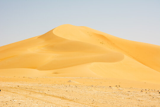 Sand dunes in the Empty Quarter (Rub' al Khali) part of the larger Arabian Desert in the United Arab Emirates.