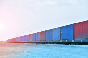 Freight Train with Cargo Containers on platform, Transport, Shipping import Export on blue sky background