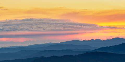 Fototapeta na wymiar The sunrise seen from the top of Monte Falco in the Apennine mountain range.