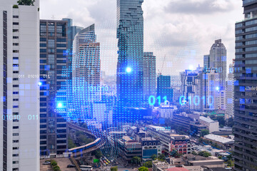 Fototapeta premium World planet Earth map hologram over panorama city view of Bangkok, Asia. The concept of international connections and business. Multi Exposure.
