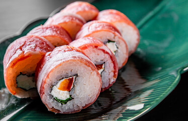 sushi roll with fish and rice in plate