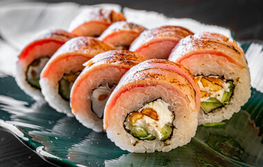 sushi roll with fish and rice in plate
