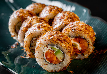 sushi roll with fish and rice in plate