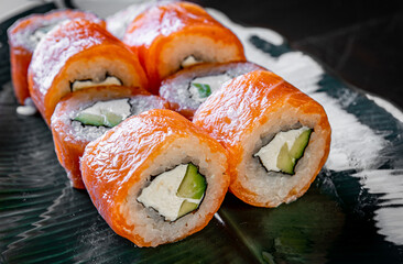 sushi roll with fish and rice in plate