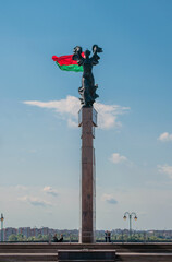 Statue of a running woman with a Belarusian flag in Mogilev (Mahilyow), Belarus. 