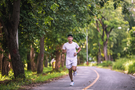 Asian men jogging and running in the park