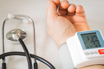Blood pressure measurement and heart rate testing. Hand measuring instrument and medical stethoscope