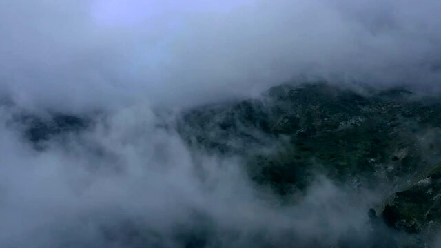 Mountain fogs, alpine autumn. Fall season spooky backdrop video.