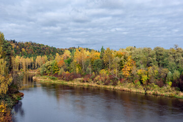 Fototapeta premium Landscape view of Gauja river in Sugulda, Latvia during the golden autumn
