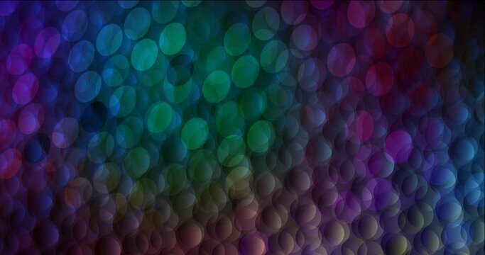 4K looping dark multicolor video footage with circles. Shining colorful animation with circle shapes. Flowing design for presentations. 4096 x 2160, 30 fps.