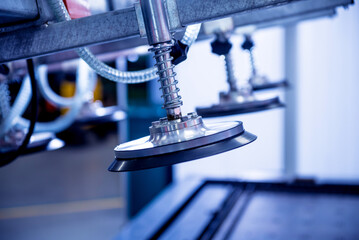 Suction cups equipment for transporting large sheets of metal