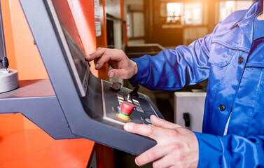 The technician operator use hydraulic bending machine.