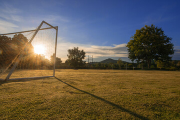 soccer goal with sun beam in the golden  morning time © lmanju