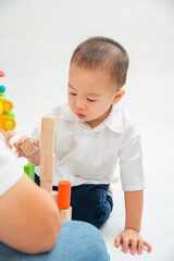 little toddler play toy with his father