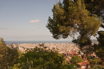 Fototapeta na wymiar Barcelona city view on a sunny day from Park Güell, Barcelona, Spain 