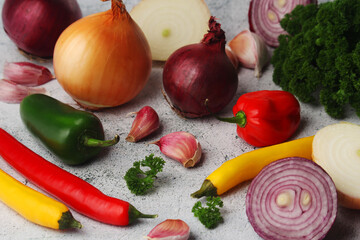 Different spices: onion. garlic, parsley and pepper
