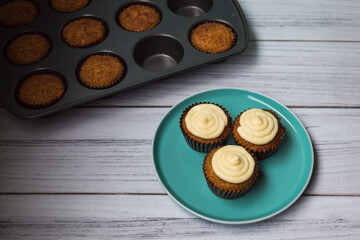 Carrot cupcakes with cream cheese frosting