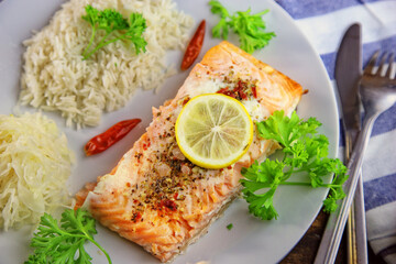 healthy baked fish salmon with rice and sauerkraut