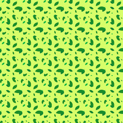 Seamless pattern with leaves on a green background