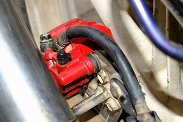 Close-up of motorcycle disc brake pump