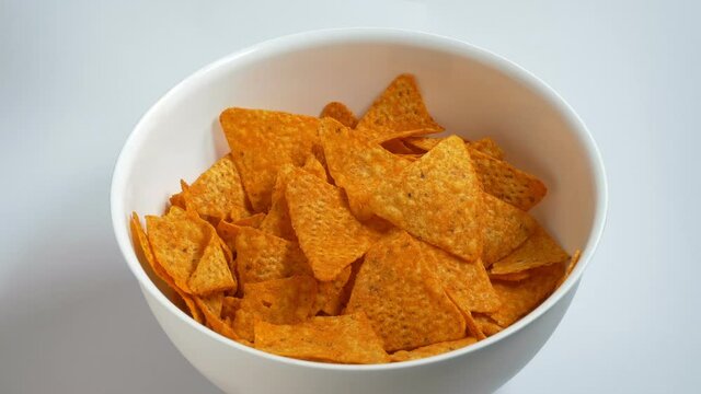 Person Takes Tortilla Chips From A Bowl