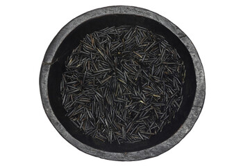 wild rice in a wooden bowl isolated on white background