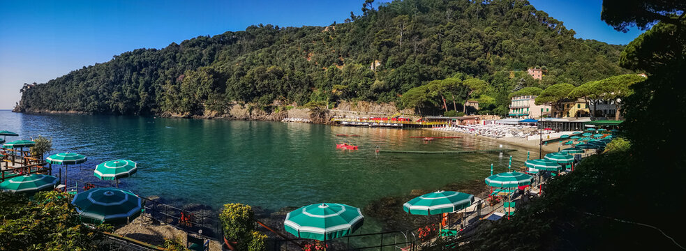 Aerial ultra wide panorama of the beach of Paraggi in Portofino