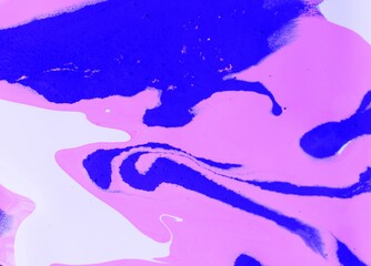 Abstract white-pink-background. Acrylic paint flows freely and creates an interesting pattern....