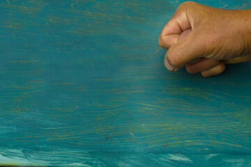  fist against the blue background