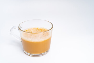 Milk tea or popularly known as The Tarik in Malaysia, isolated on the white background center of the frame
