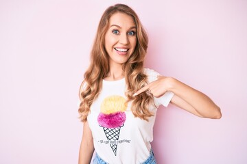 Young caucasian woman with blond hair wearing casual summer clothes pointing finger to one self smiling happy and proud