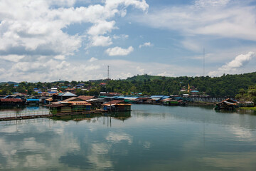 Fototapeta na wymiar Floating raft houses and mon bridge, Sangkhlaburi