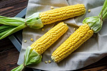 corn on the cob on table