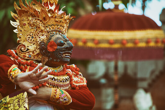 Traditional Balinese costume and mask Tari Wayang Topeng - characters of Bali culture. Temple ritual dance at ceremony on religious holiday. Ethnic festivals, arts of Indonesian people