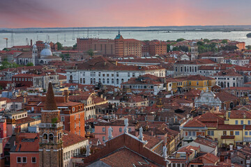 Fototapeta na wymiar Venice, Italy. Old town landscape architectural panoramic sunset view.