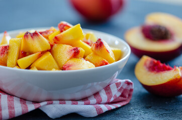 Chopped peaches  on a  table,  closeup.