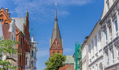 Fototapeta na wymiar Church tower and historic facades in Flensburg, Germany