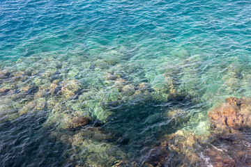 Abstract background view on rocks under sea surface. 