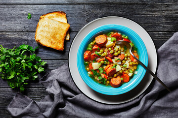 German split pea soup with sausage on a plate