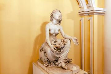 Statue. Girl with a tambourine