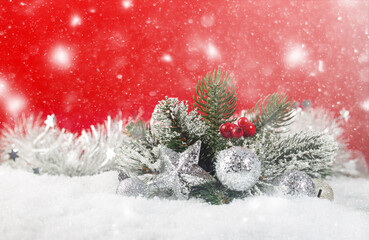 Fototapeta na wymiar Christmas decoration with fir branch and balls on snow