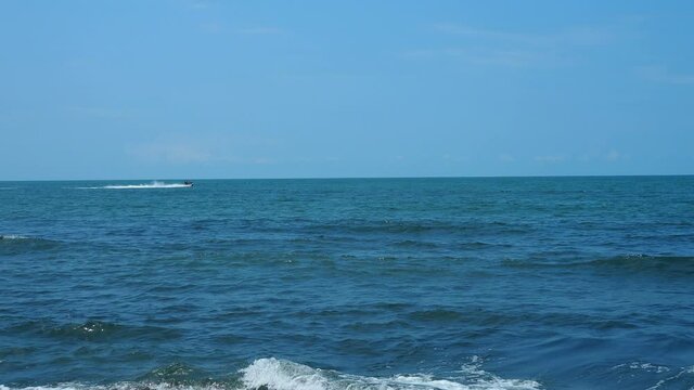 A walk on the sea on a hydrocycle and a motor boat, a hydrocycle at high speed rides the sea, Watercraft. water bike, The Hydrocycle, Man on Jet Ski.