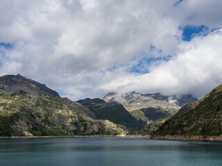Naklejka na ściany i meble Dramatic mountainscape of lake Emosson in Switzerland Alps. Great for large prints!