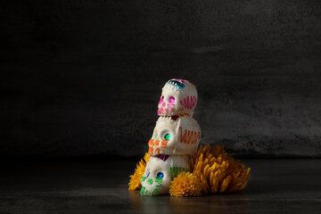 Day of the dead composition, sugar skulls, with black background