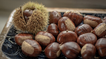 sweet chestnuts rustic composition on daylight
