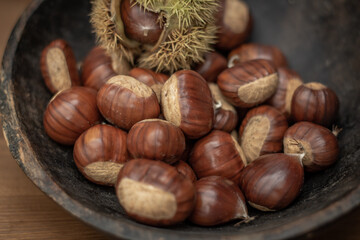 sweet chestnuts rustic composition on daylight