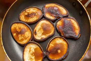Homemade cake. A few burnt pancakes in the pan. The view from the top
