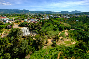 Fototapeta na wymiar The Elephant Waterfall in Dalat in central Vietnam as seen from above from the giant Buddha statue