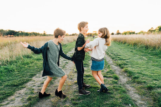 Young Children Acting Silly Outdoors