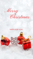 Greeting card for Christmas and New Year decorations red toys balls on the snow sparkling silver background banner with copy space. White snowflakes bokeh. Text